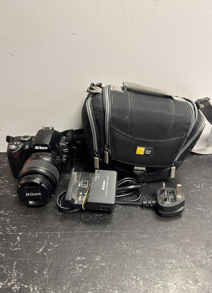 Canon EOS 40D + Nikon  18-55mm lens