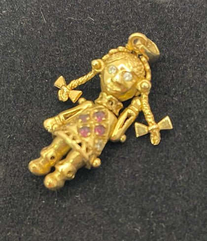 Gold pendent doll