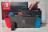 Nintendo Switch Neon Red/Blue & 1 Game