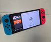 Nintendo Switch OLED - Neon Blue/Neon Red & 1 Unboxed Game