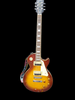 Epiphone Les Paul Classic Honey Burst 6 string electric guitar with beatles strap