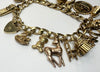 9ct yellow gold charm bracelet with safety chain