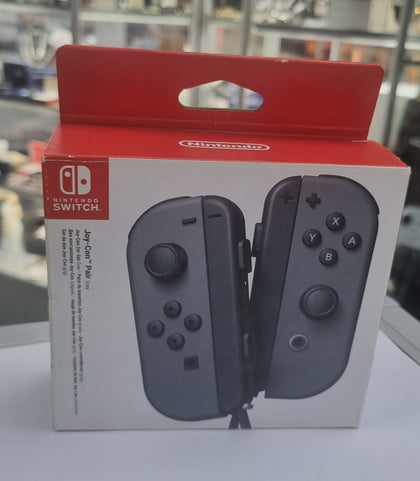 NINTENDO SWITCH GREY JOYCONS RIGHT AND LEFT NEW