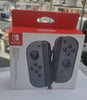 NINTENDO SWITCH GREY JOYCONS RIGHT AND LEFT NEW