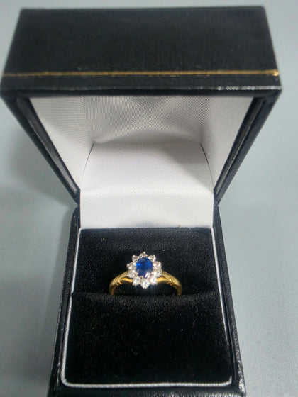 18CT Gold Ring 3.8G HM 375 Size O With Blue Stone
