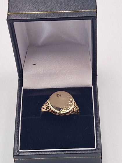 9ct Yellow Gold Oval Half-Engraved Signet Ring With A Star Set CZ Stone - Size R - 3.10 Grams