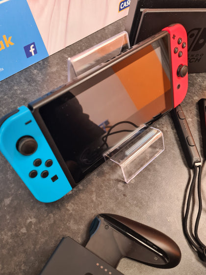 Nintendo Switch Console - Neon Red/Blue with accessories boxed LEIGH STORE.