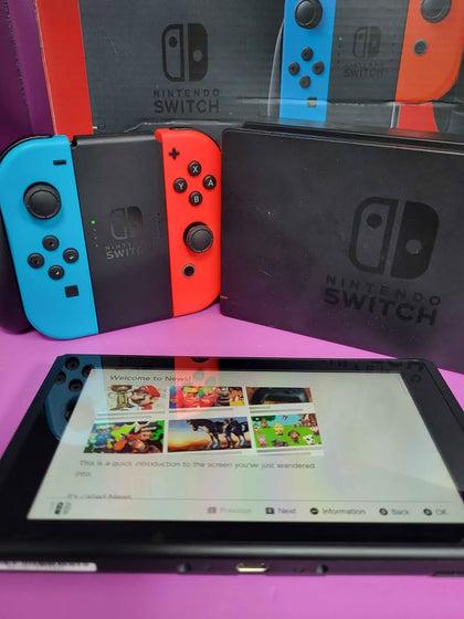 Nintendo Switch console 32GB + Neon Red/Blue Joy-Cons, Dock And Comfort Grip