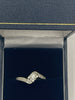 9ct White Gold Ring With Clear Stones  - O