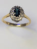 18ct gold diamond & black stone ring
