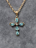 9ct Yellow Gold Cross Claw Set With Pale Blue Stones  & Belcher Chain -  16"