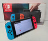 Nintendo Switch Neon Red/Blue & 1 Game