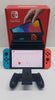 Switch Console 64GB OLED + Neon Red & Blue JoY CON COMES BOXED