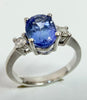 18ct white gold three stone Tanzanite and diamond ring size J