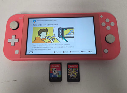 Nintendo Switch Lite Coral & 2 unboxed Games games