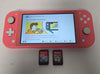 Nintendo Switch Lite Coral & 2 unboxed Games games