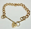 9ct yellow gold curb link bracelet with heart clasp 7"
