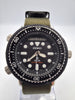 Seiko Arnie SNJ025 Hybrid prospex analogue/digital solar divers watch with green nato strap, box, papers and warranty card.