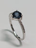 9ct White Gold Ring with Blue Stone - Size K