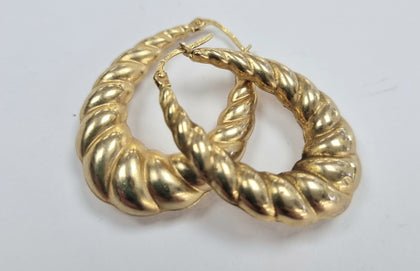 9ct gold horseshoe earrings.