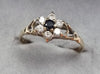9ct Gold Ring with Clear/Black Stones Size "Q"