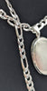 925 HALLMARKED SILVER, LOCKET ON A FIGARO CHAIN, 22", 32.2G