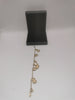 9K Gold Bracelet with 7 Charms 6.8G Hallmarked(375) and Tested 7" Length