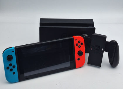 Nintendo Switch 32GB gaming Console with red/blue joycons, original charger, cradle and dock UNBOXED