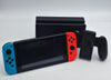 Nintendo Switch 32GB gaming Console with red/blue joycons, original charger, cradle and dock UNBOXED