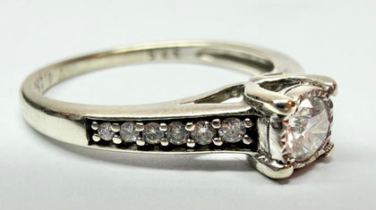 9ct White gold and diamond solitaire size N
