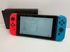 Nintendo Switch (Neon Red/Blue) with lets sing 2025