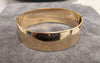 HENRY GRIFFITHS & SONS 9ct GOLD METAL CORE BANGLE WITH SAFETY CHAIN 50.4G