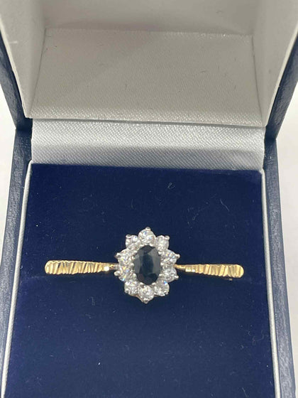 9ct Gold Pin with Black & clear Stones