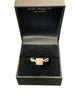 14ct Princess cut solitaire surrounded by brilliant cut diamonds size Q