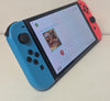 Nintendo Switch OLED - Neon Blue/Neon Red & 2 Games