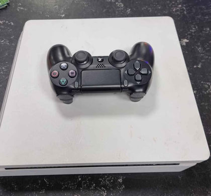 PlayStation 4 slim console white 500gb.with pad and leads .