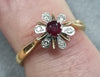 18ct diamond ruby flower ring