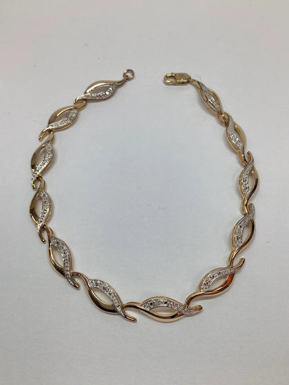 9ct yellow gold diamond twist bracelet 7.5