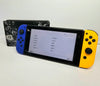 Nintendo Switch 32GB Navy Blue & Orange Joy-Con Handheld Console