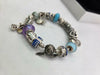 pandora ' golden snitch'  charm bracelet with 15 charms , silver (925) 54.5 grams