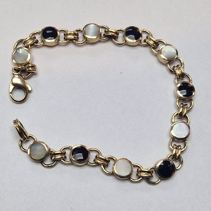 9CT GOLD BRACELET  WITH BLACK/SILVER COLOURED STONE PRESTON STORE