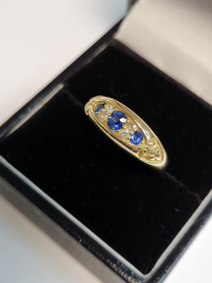 18ct Yellow Gold Ring With Clear And Blue Stones - 4.40G - Size O