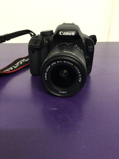 Canon EOS 550D SLR Digital Camera with 18-55mm lens, 2 batteries and a charger.