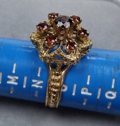 9ct Gold Flower style Ring with Red Stones Size O