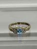 Ring with a light blue stone 2.7g 9ct GOLD with box in excellent condition