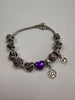 PANDORA CHARM BRACELET + 11 CHARMS LEYLAND STORE