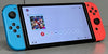 Nintendo Switch Neon Red/Blue OLED Console Bundle ( + Unboxed Mario Kart 8 Deluxe ) ** Boxed **
