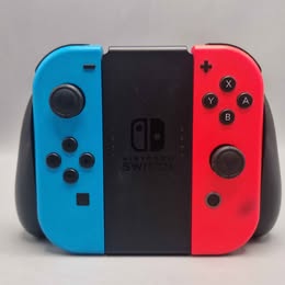 Nintendo Joycons And Grip Holder Neon