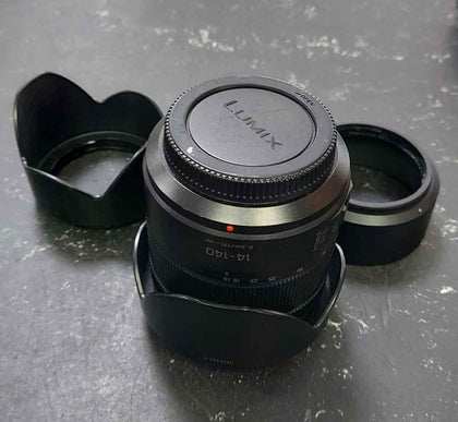 Lumix 14-140  g Vario 3.5-5.6 { 2nd gen )BODY ONLY WITH FRONT