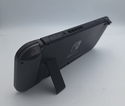 Nintendo Switch 32GB black gaming console with black joy-cons and original charger UNBOXED